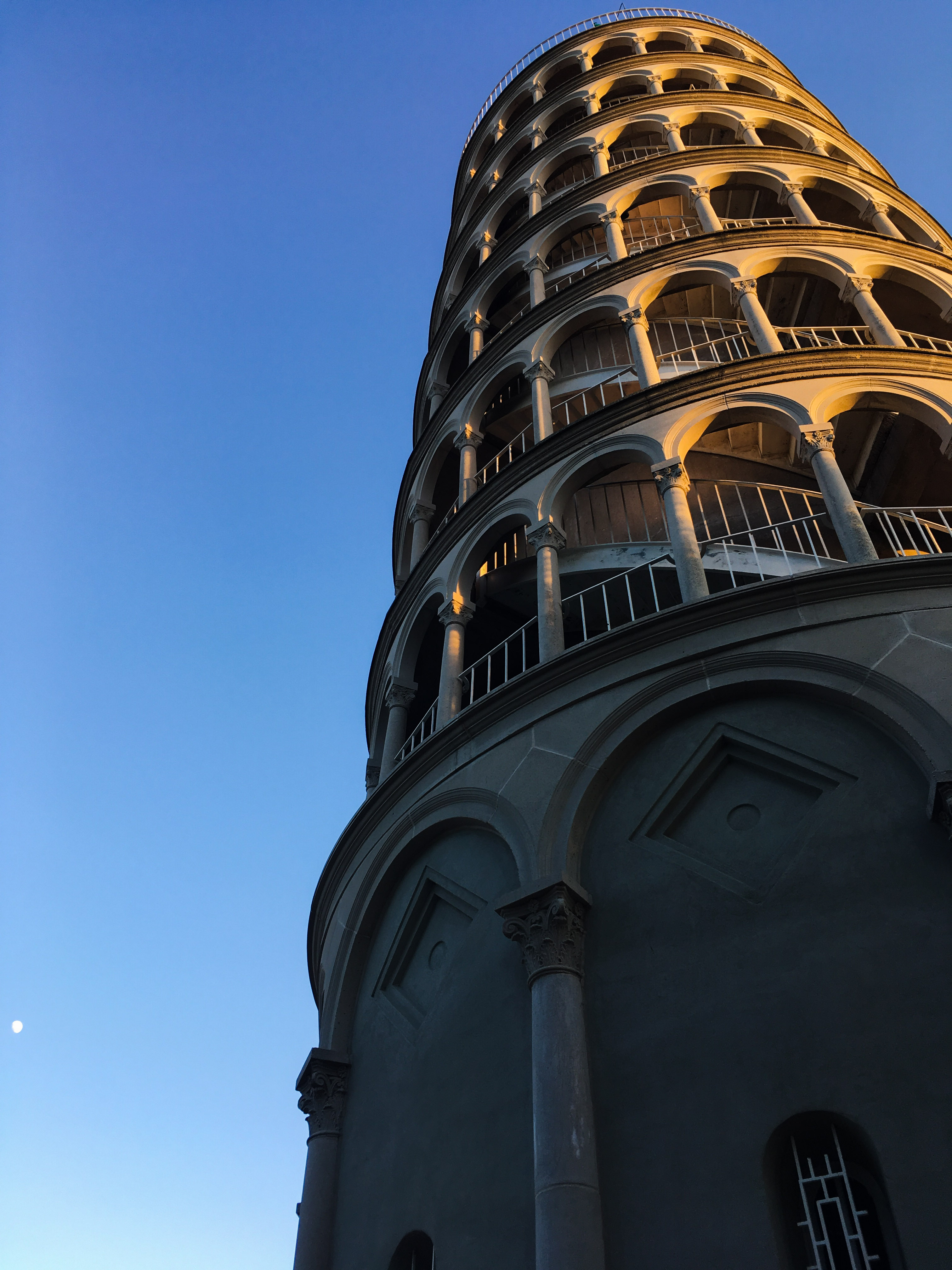 a tall tower with many arches