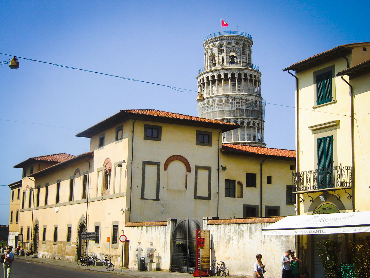 a building with a tower in the background