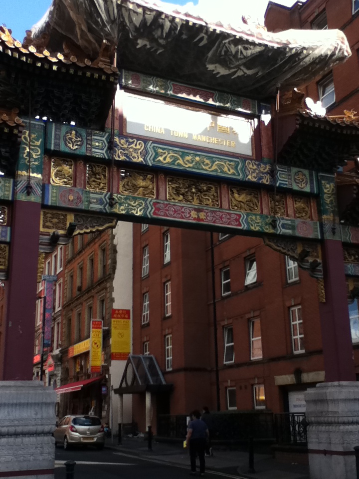 a large archway in Chinatown, Manchester