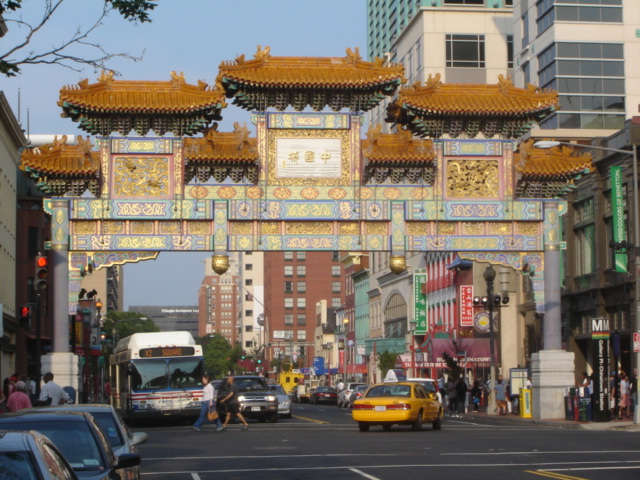 a street with a large archway over it