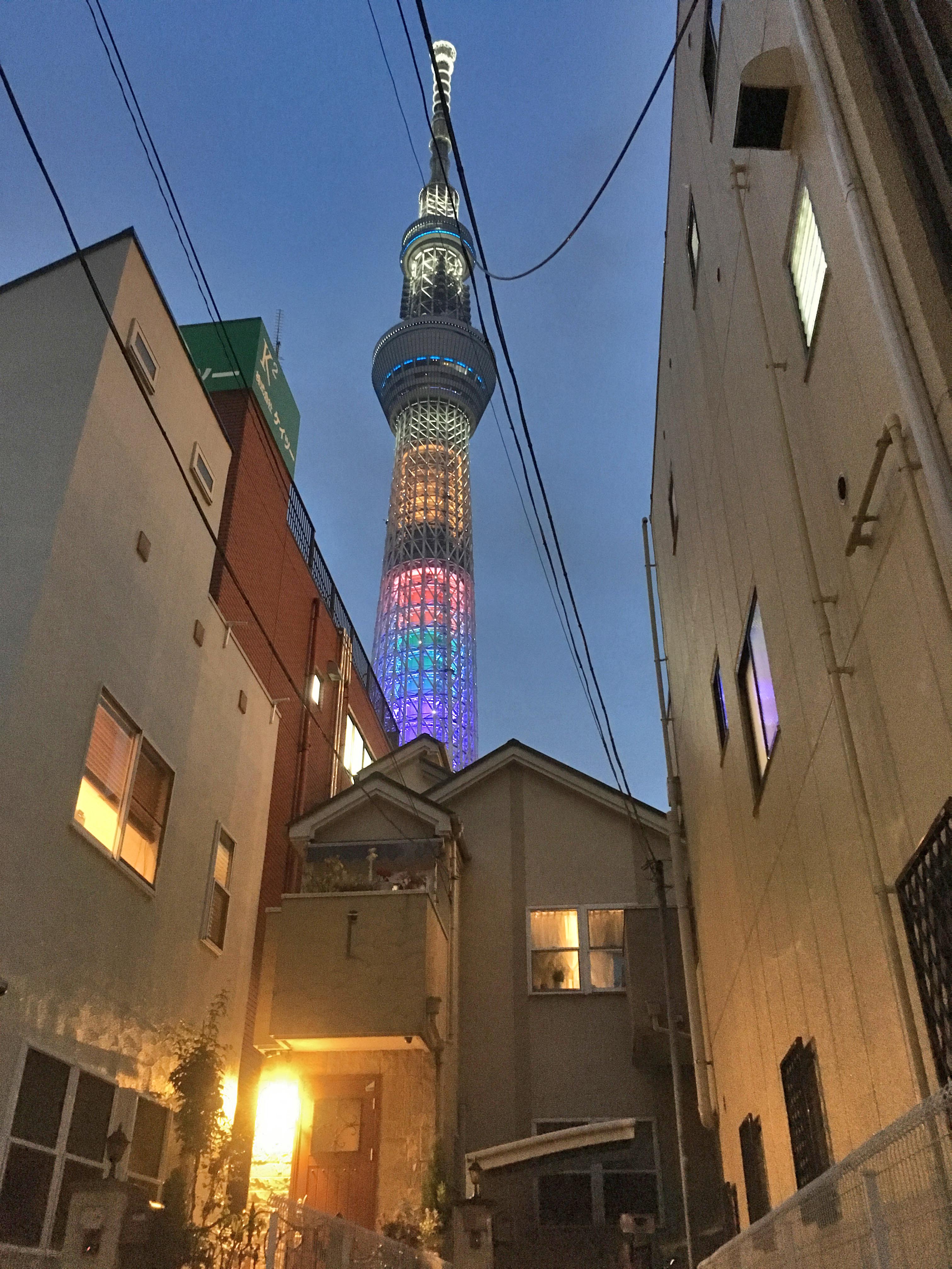 a tall tower with multicolored lights