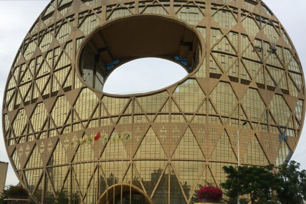 a circular building with a hole in the middle