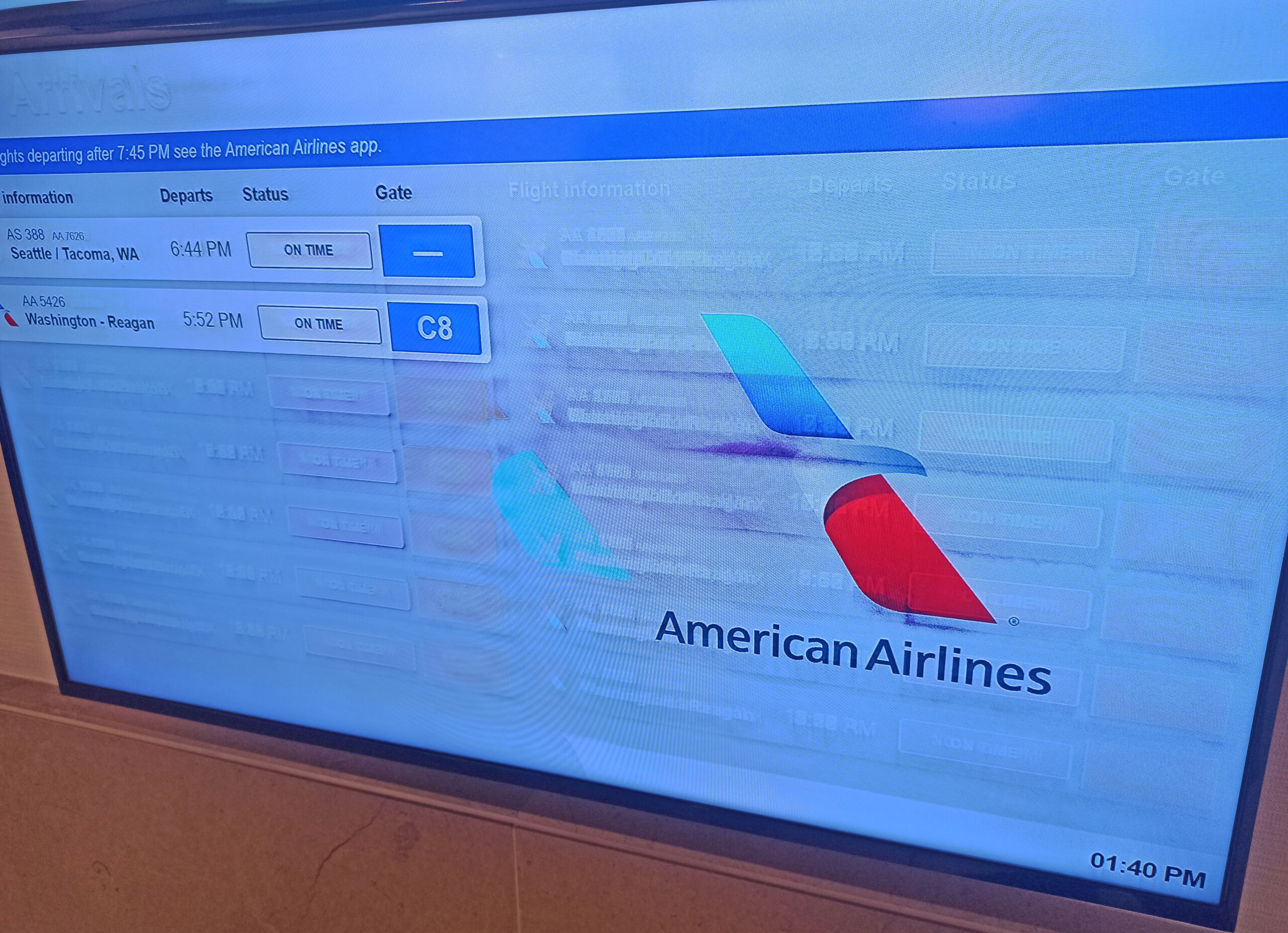Burned-in FIDS (Flight Information Display Screen) at St. Louis Admirals Club