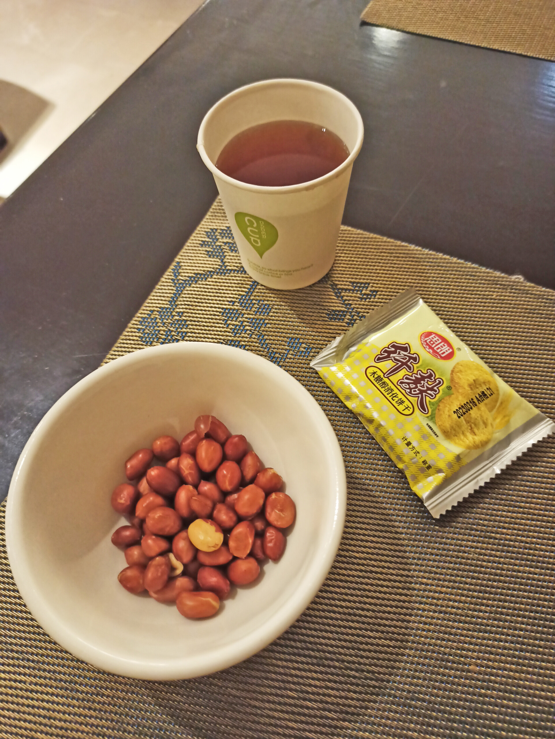 Lounge Snack: Peanuts, Bran Digestives, and Wulong Tea