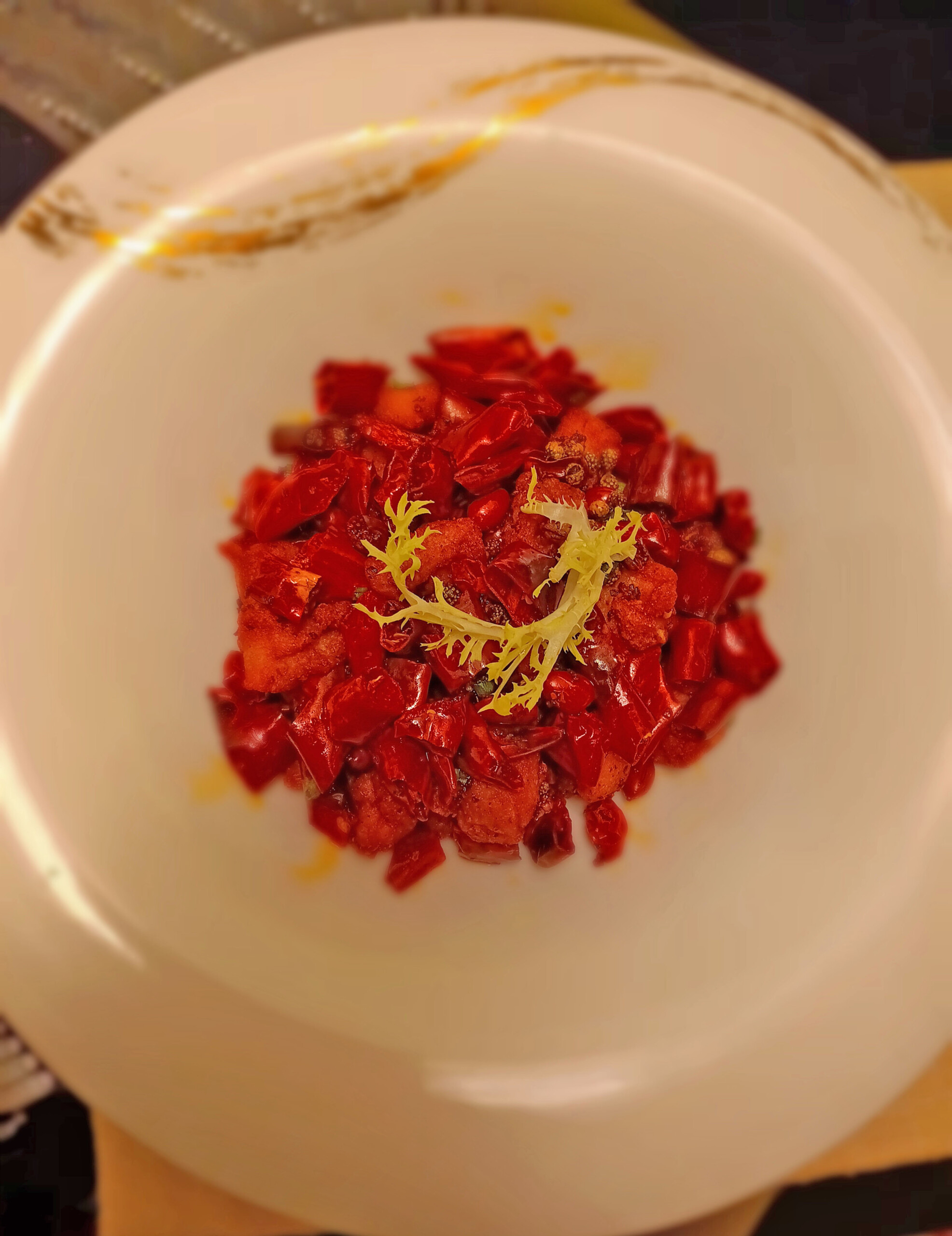 Wok-fried chicken with red peppers