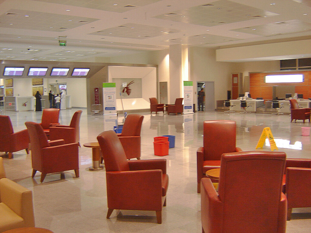 a large room with chairs and tables