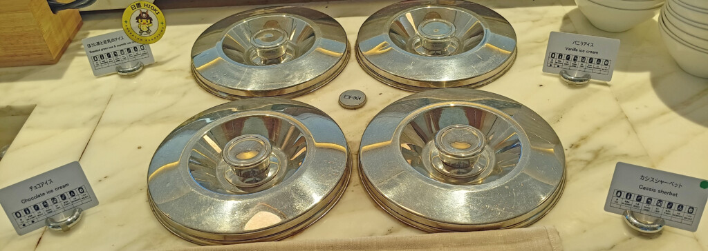 a group of metal lids