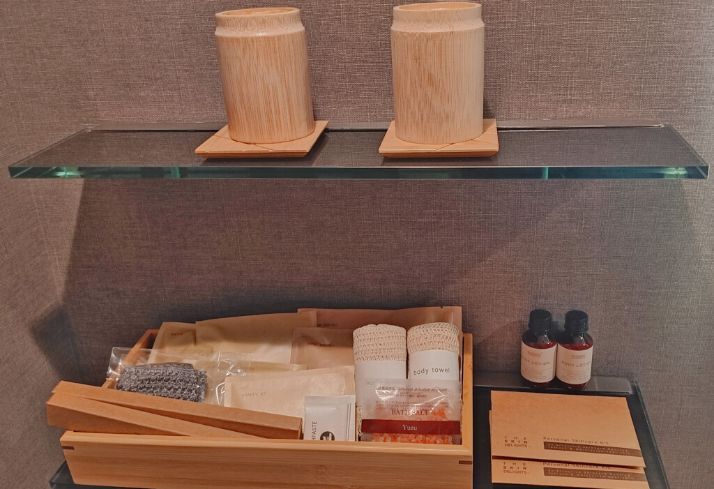 a shelf with a wooden container and a box of food