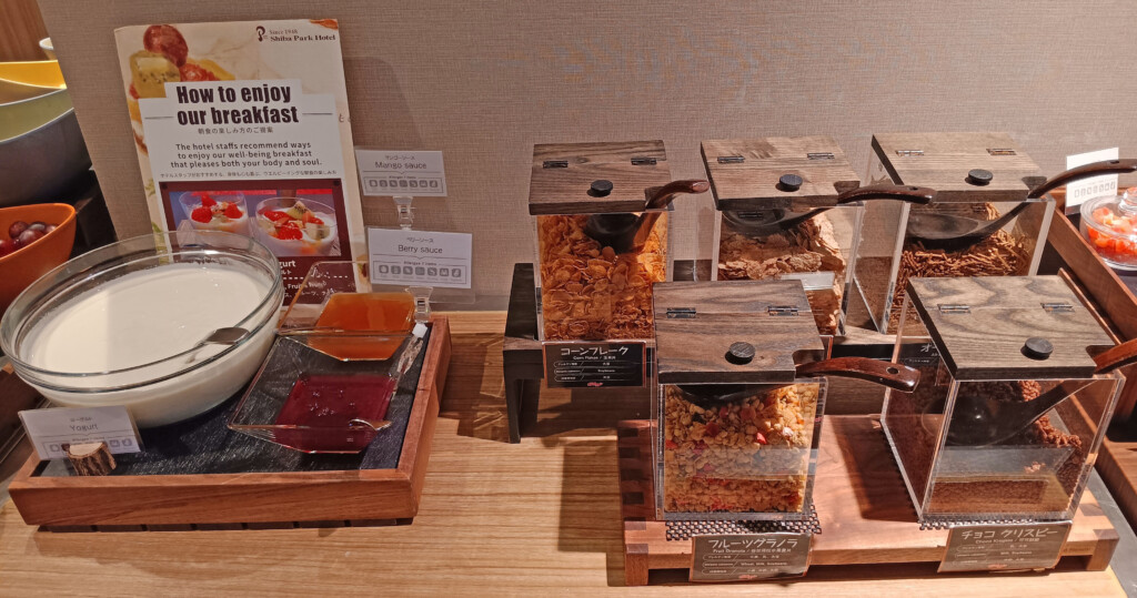 a group of containers with food on them