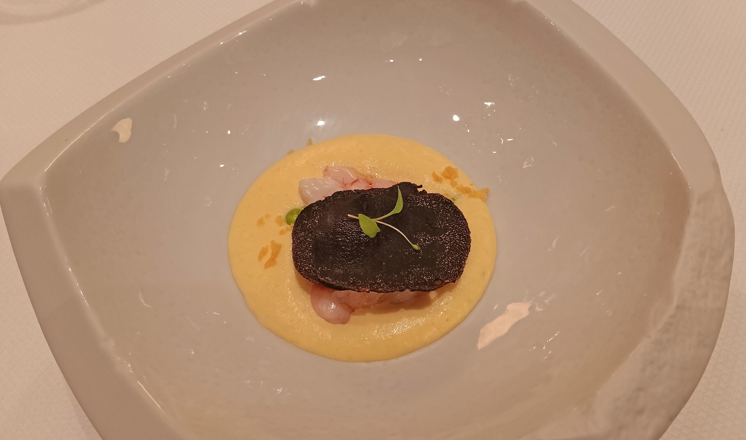 Shrimp with black truffle amuse-bouche