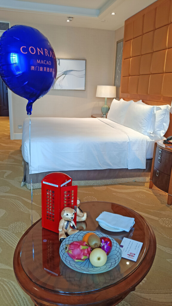 a balloon on a table in a hotel room