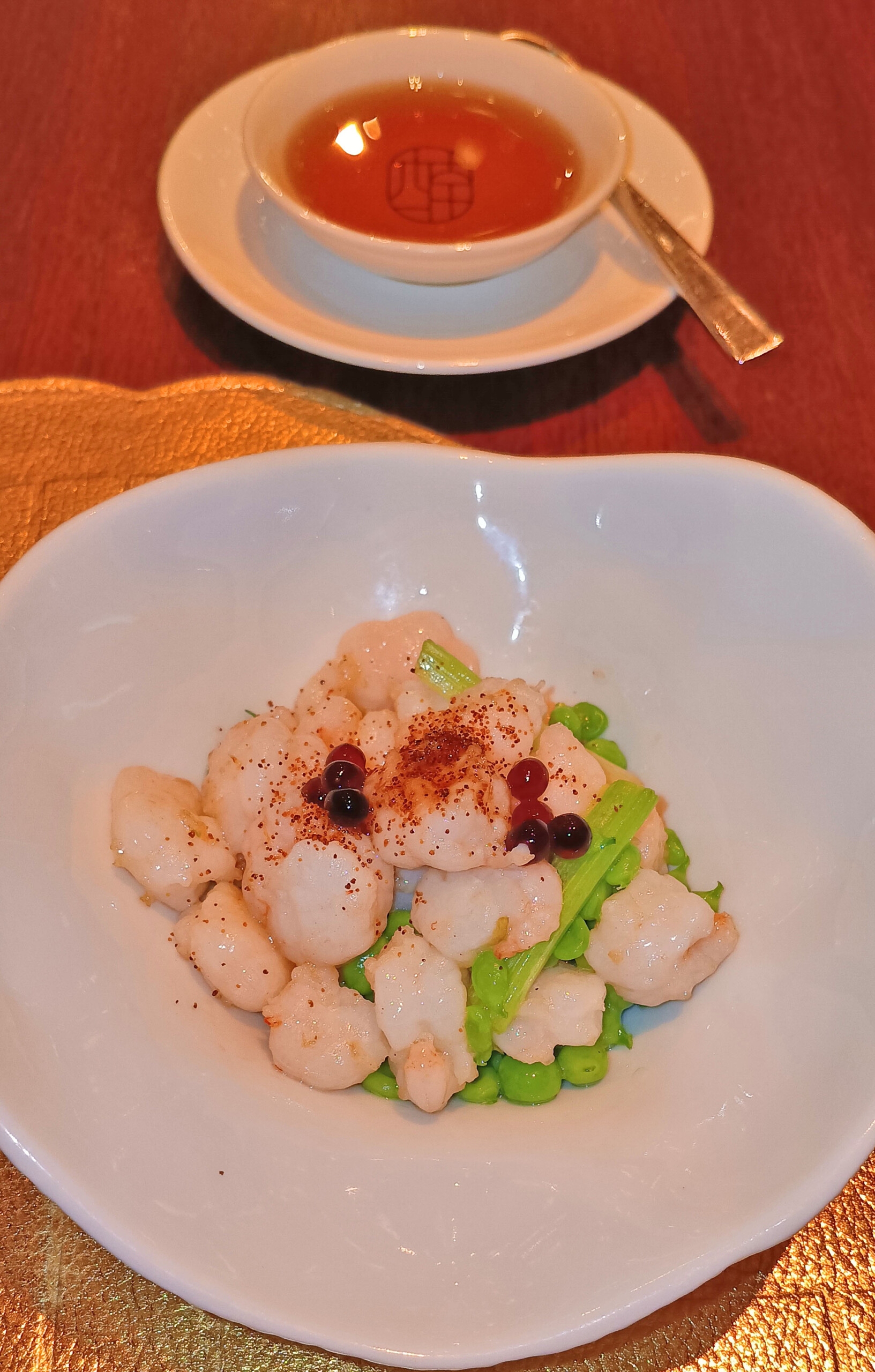 Sautéed river shrimp with shrimp roe, snap peas, and gorgon fruit