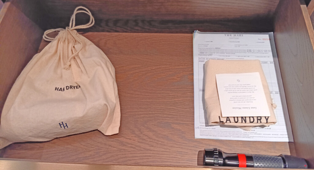 a bag and a flashlight on a table