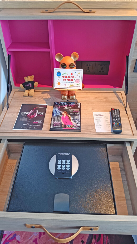 a desk with a book and a card on it