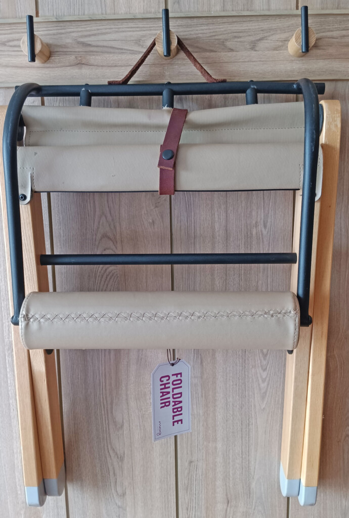 a roll of fabric on a rack