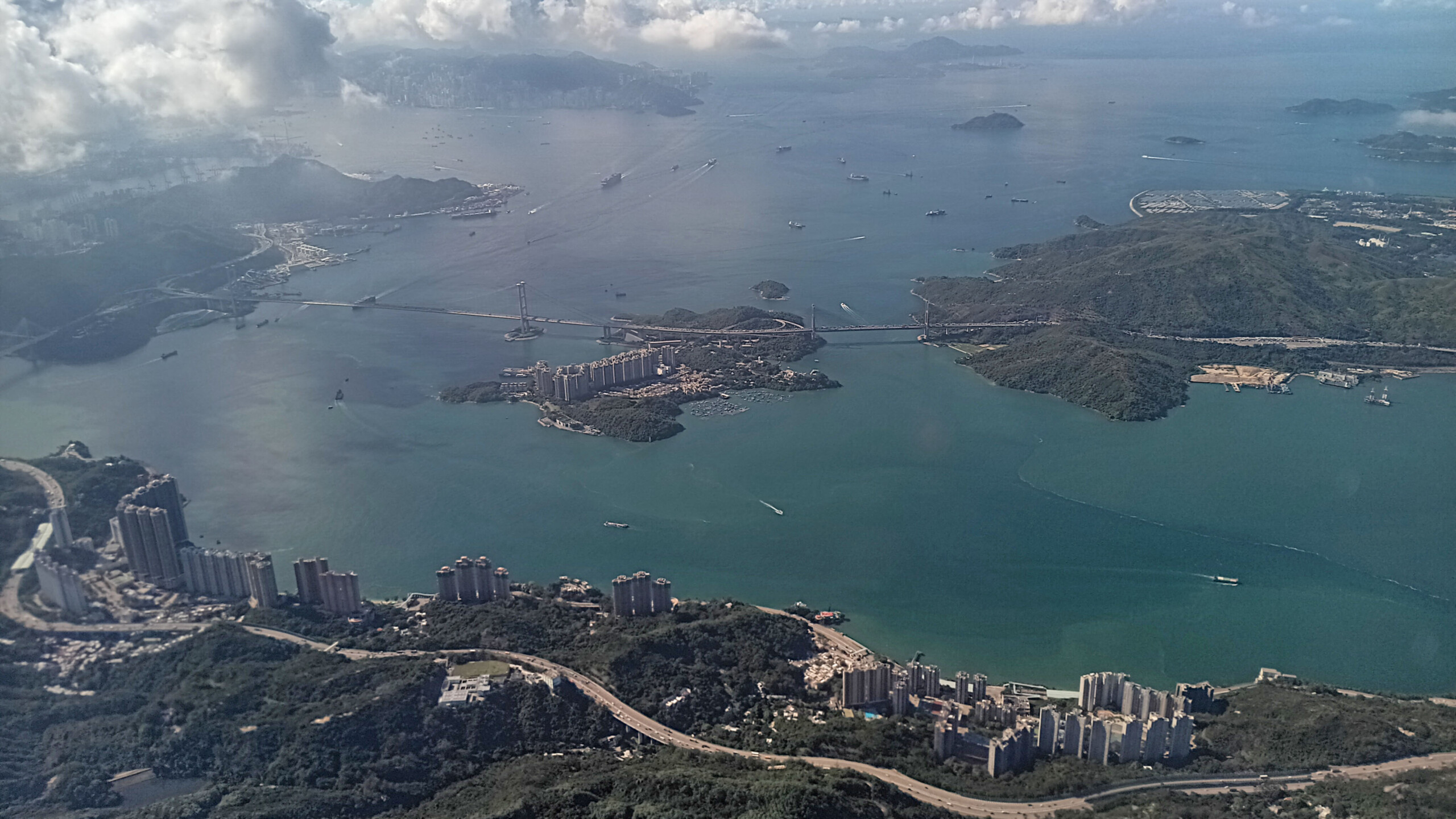 a aerial view of a city and a body of water