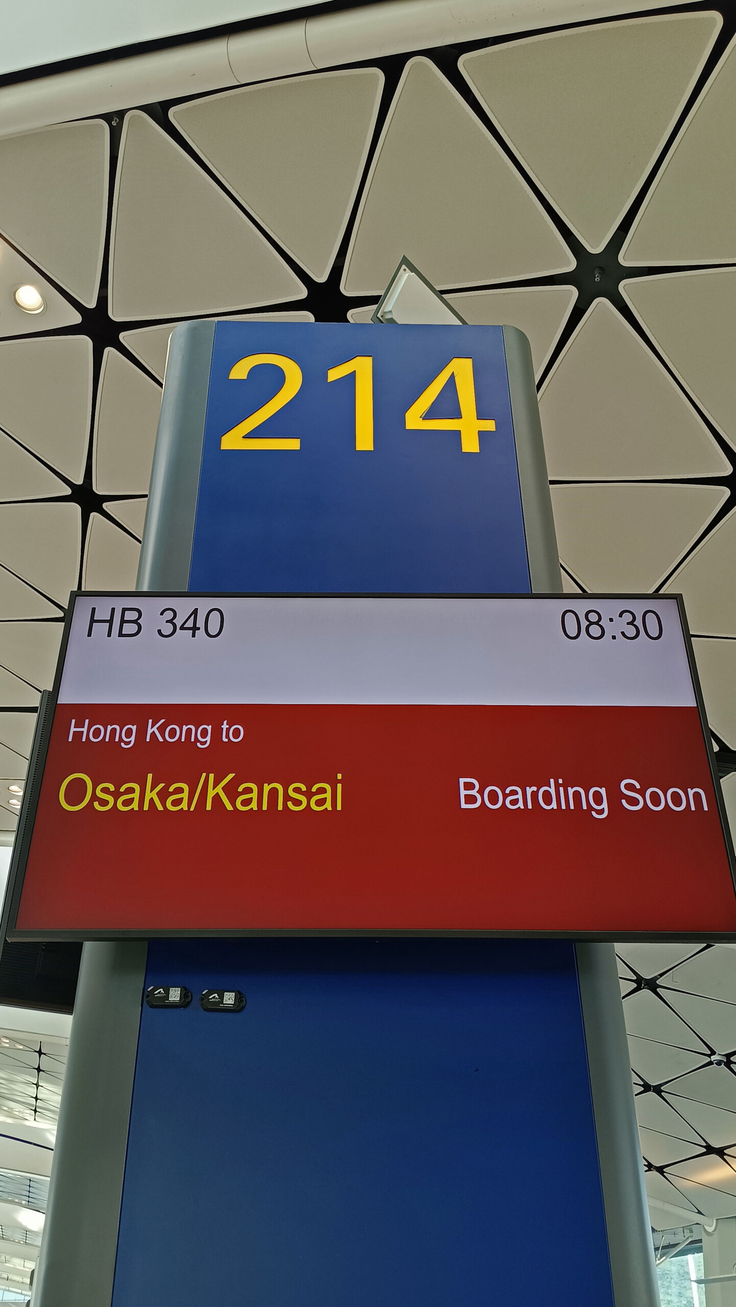 a sign with numbers and a red white and blue sign