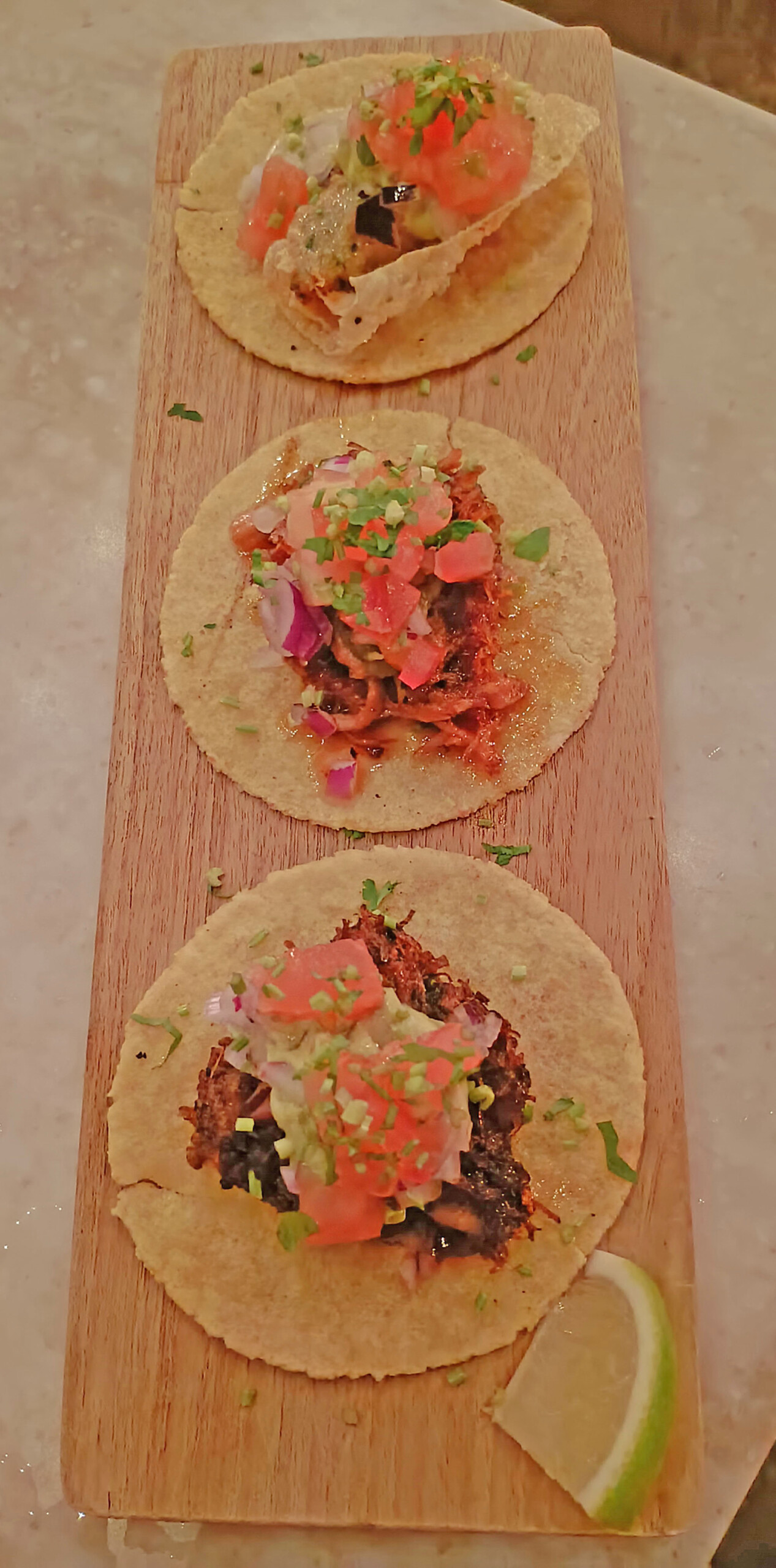 Carnitas, shrimp, suadero tacos
