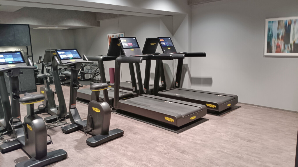 a group of treadmills in a room