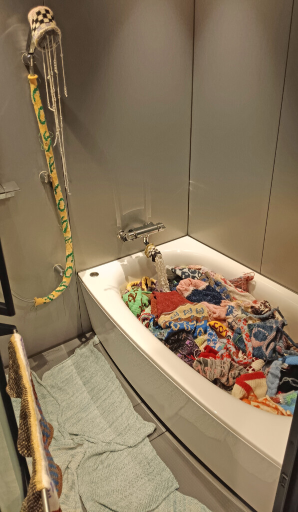 a bathtub full of clothes