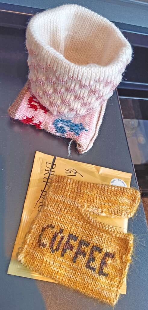 a close up of a knitted mitten