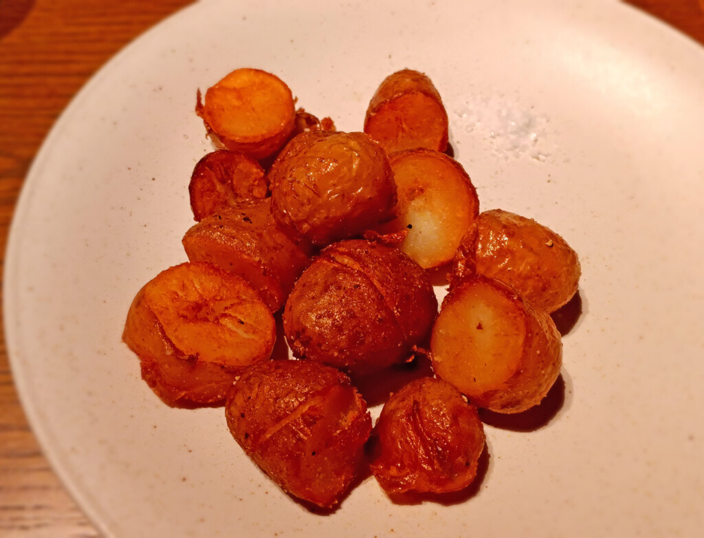 a plate of fried potatoes