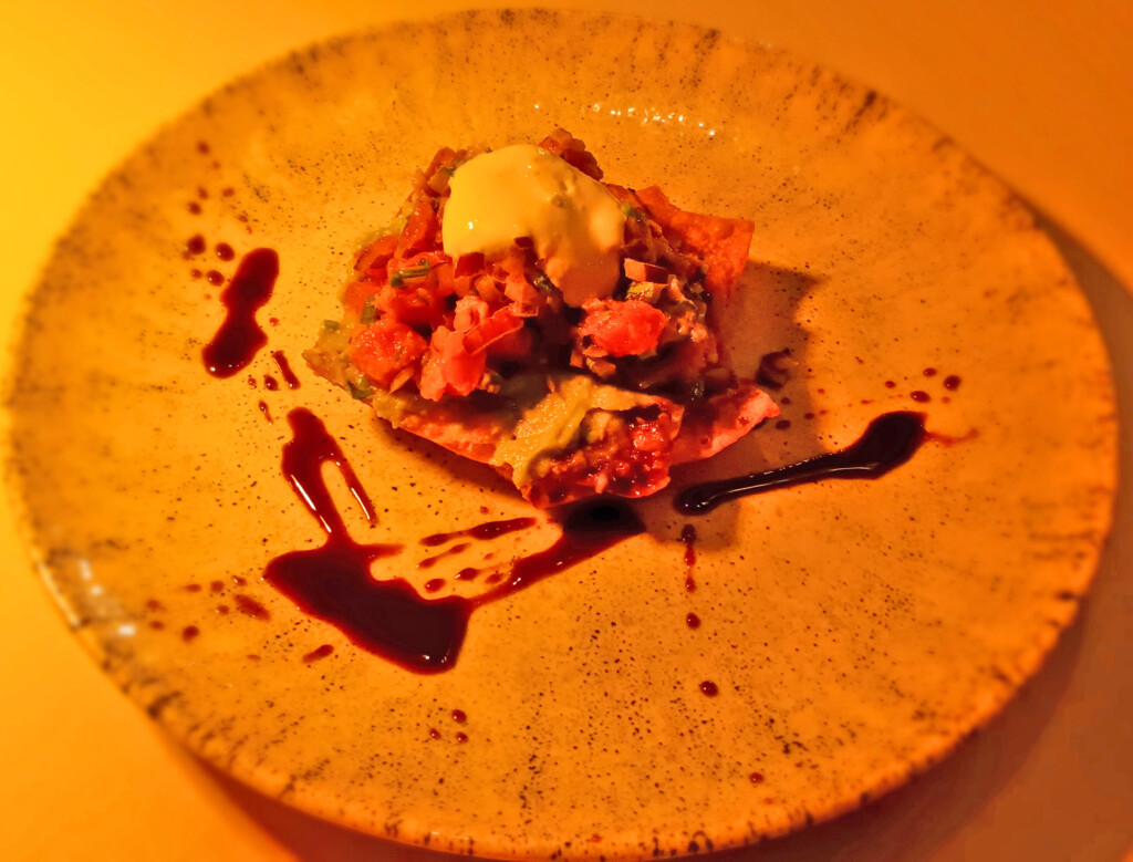 a plate of food with sauce on it