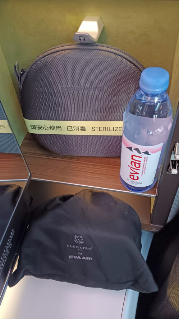 Headphones and Evian water