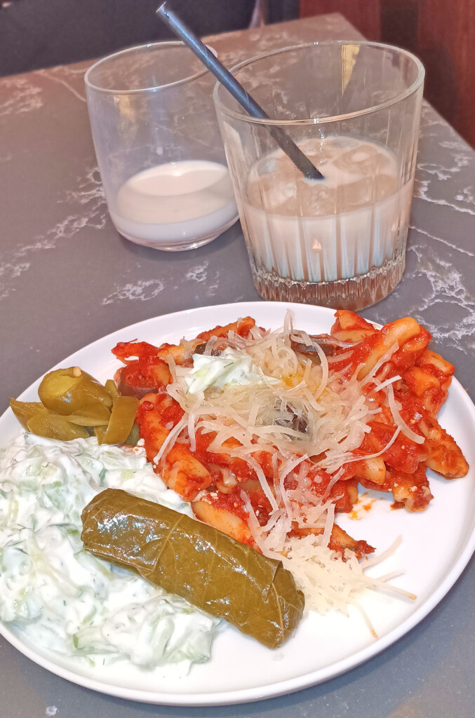 a plate of food and a glass of milk