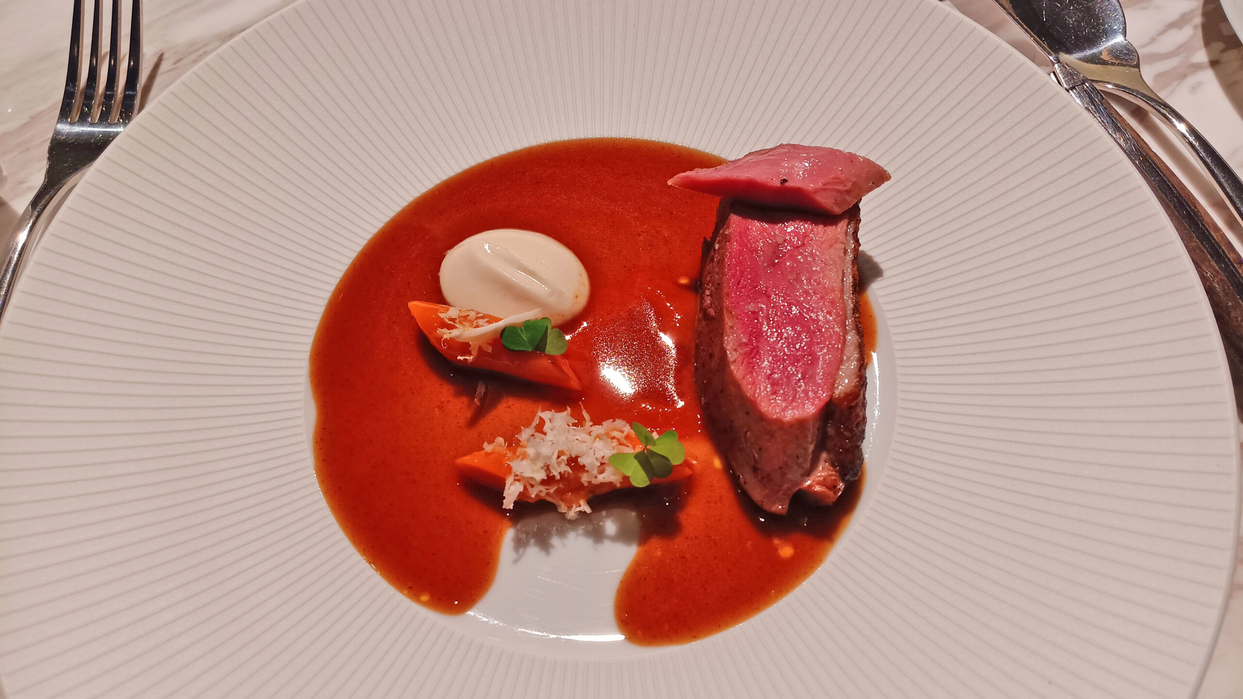 Roasted Challans (from the Vendée region) duck & pumpkin gnocchi with almond purée and infused jus