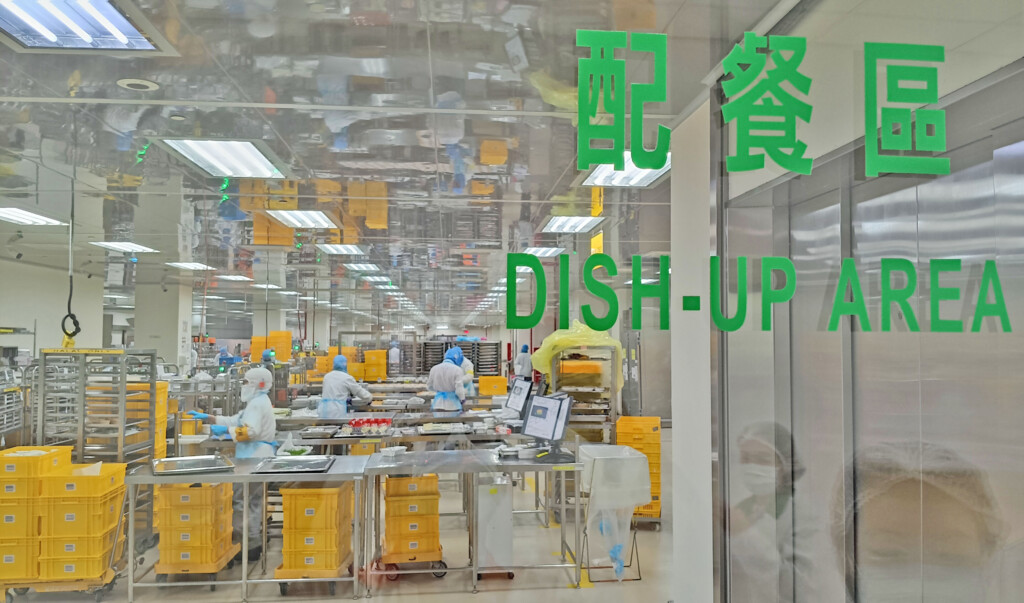 a group of people in a factory