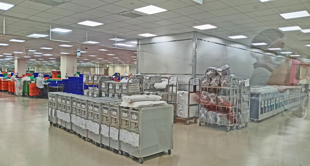 a warehouse with carts and boxes