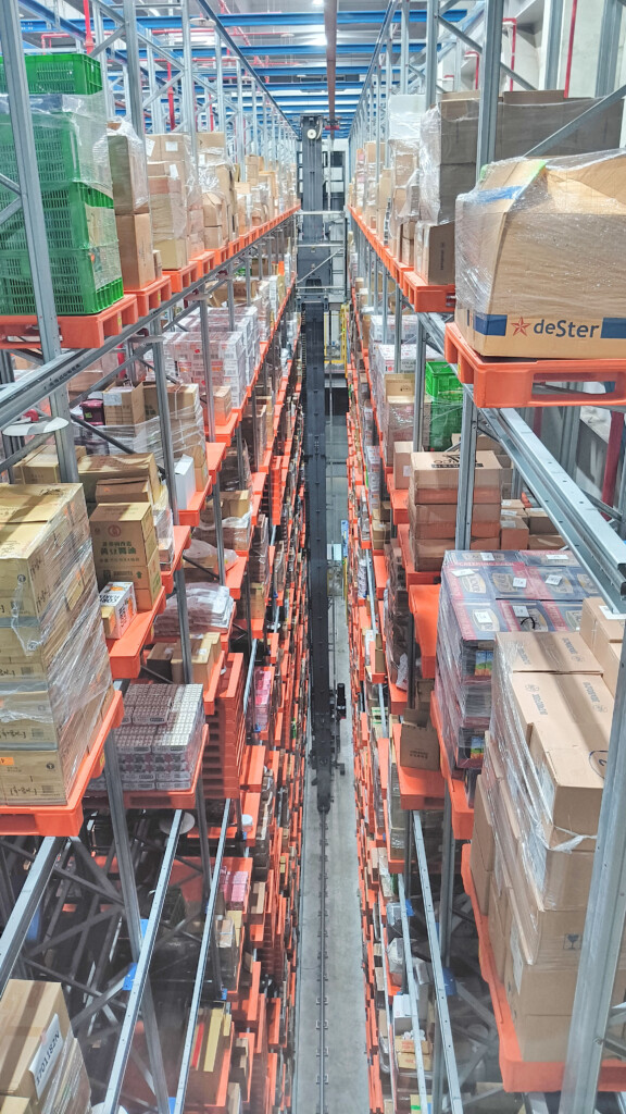 a warehouse with boxes on shelves