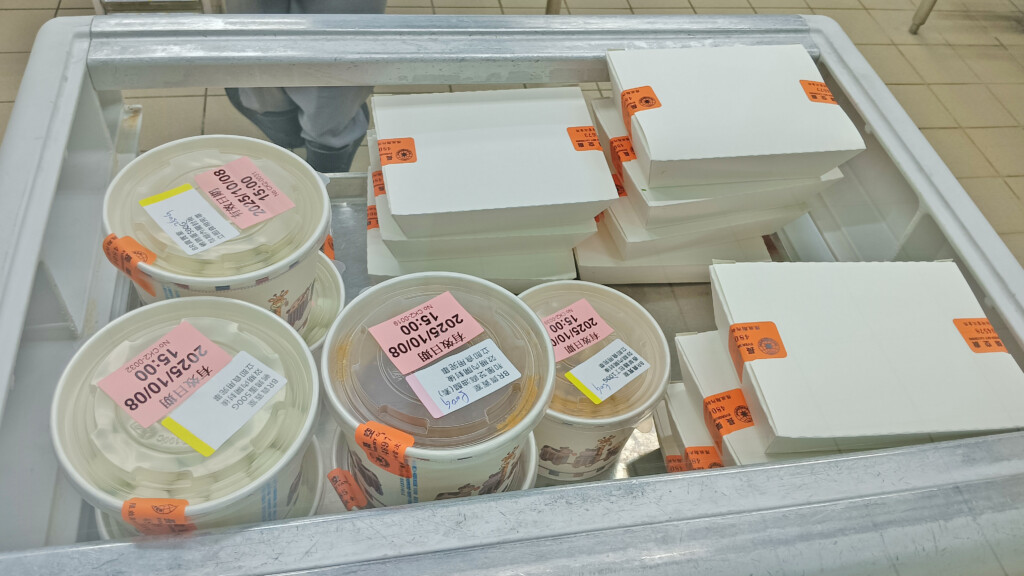 a group of plastic containers with labels on them