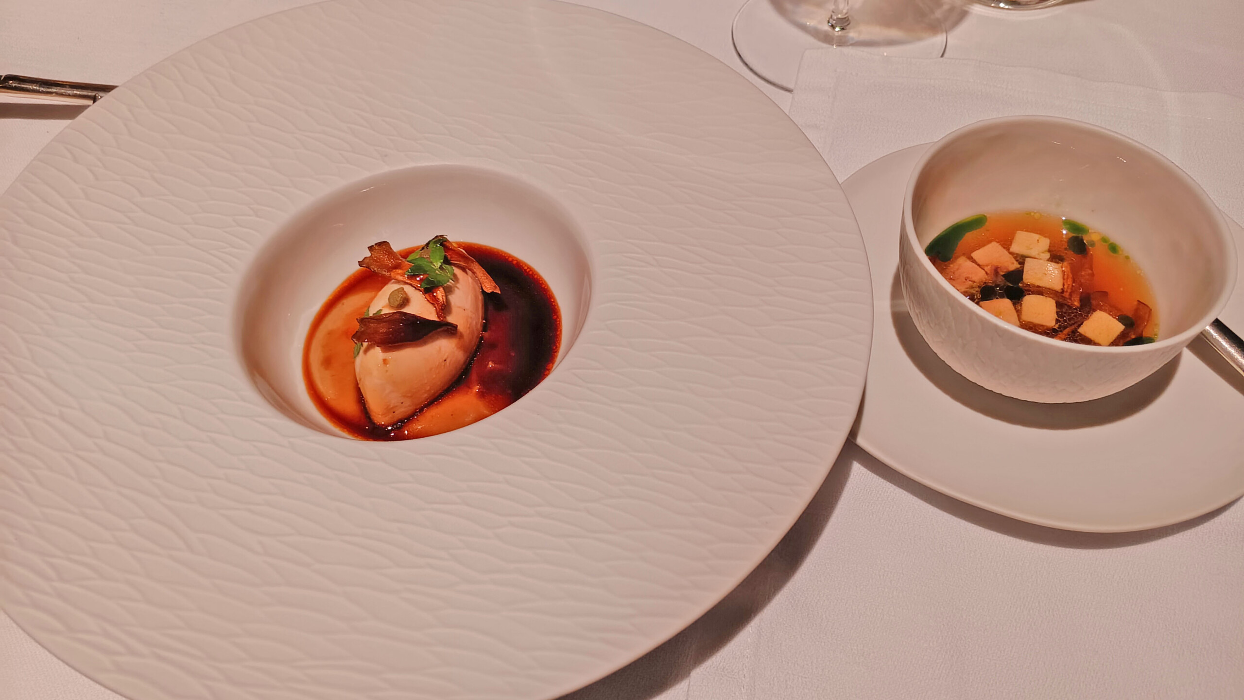 Pheasant quenelles & dashi with foie gras, maitake mushroom, sansho pepper