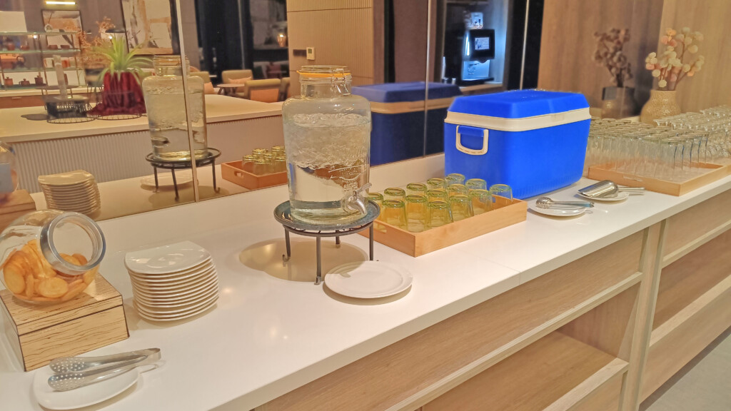 a glass jar with water on a table