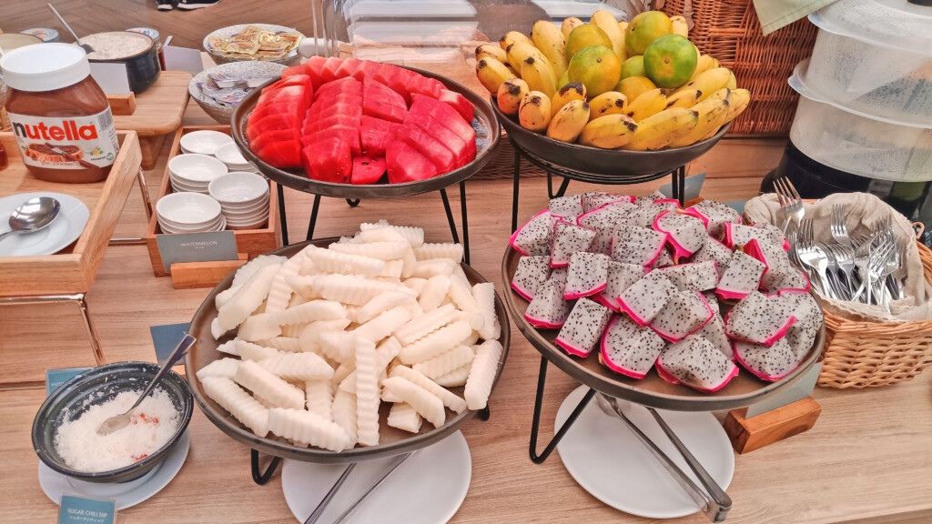 a group of plates of fruit