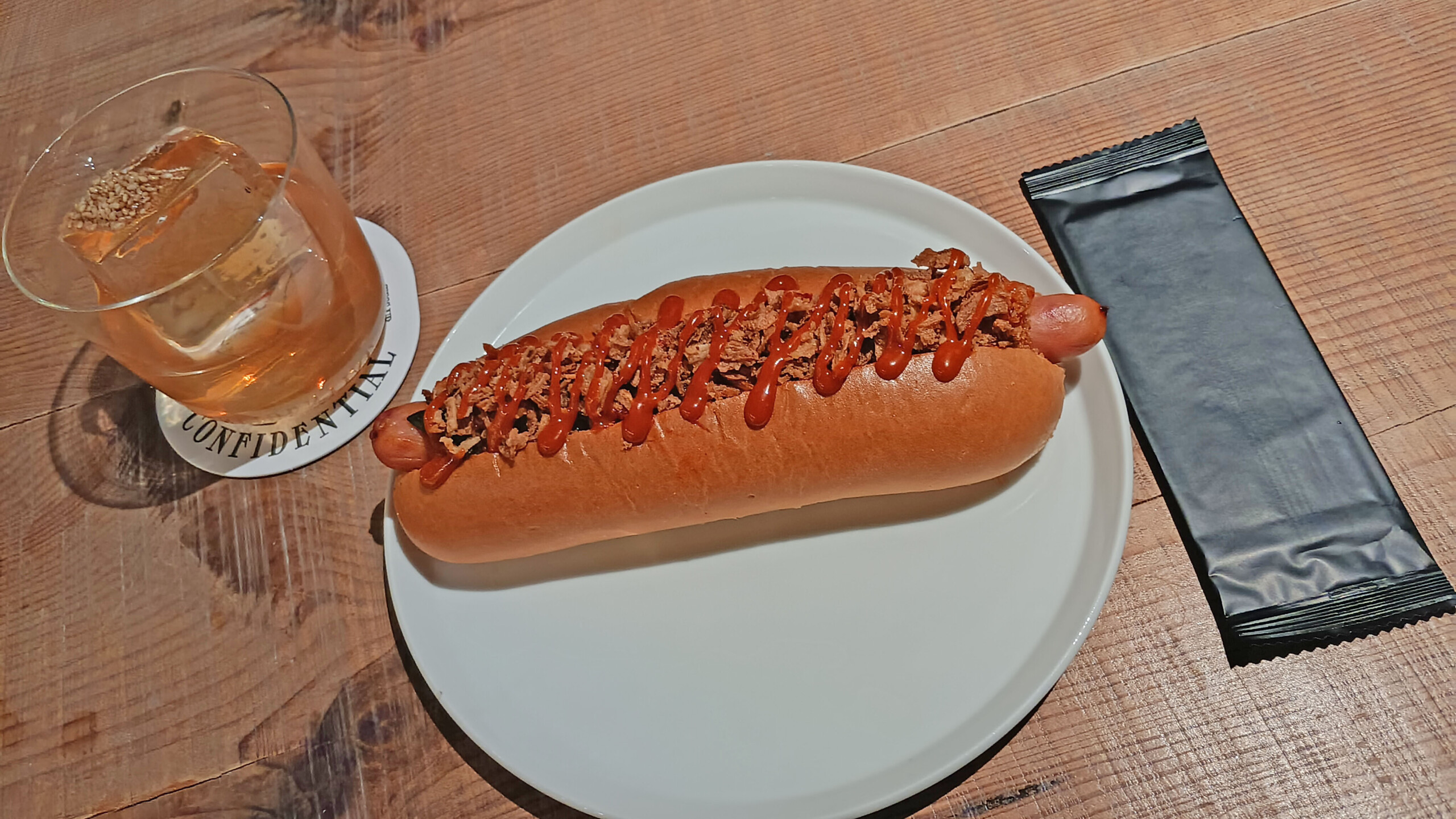 Doosan hot dog with doenjang (fermented soybean paste), crispy onions, and kimchi