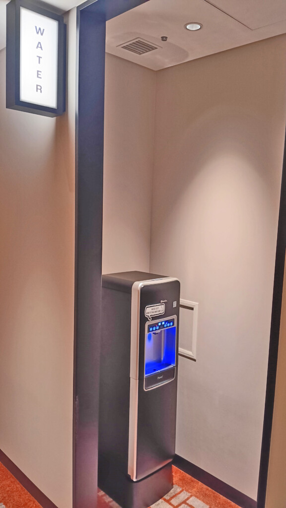 a water dispenser in a room