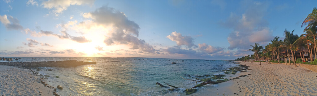 a beach with rocks and water
