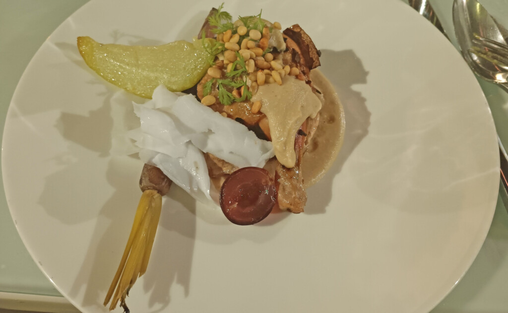 a plate of food on a white surface