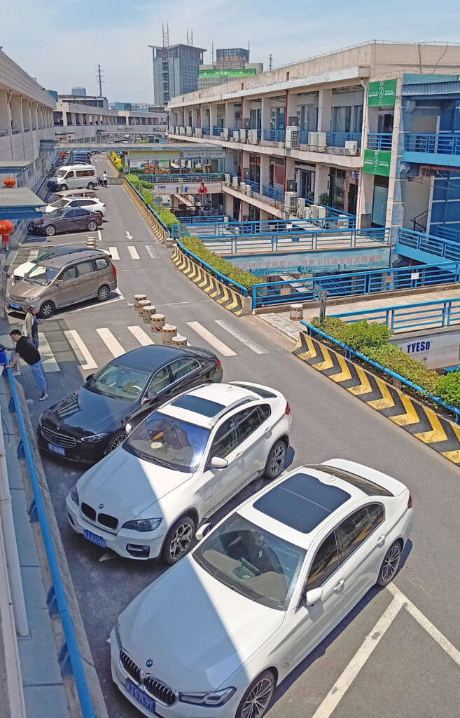 a group of cars parked on a street