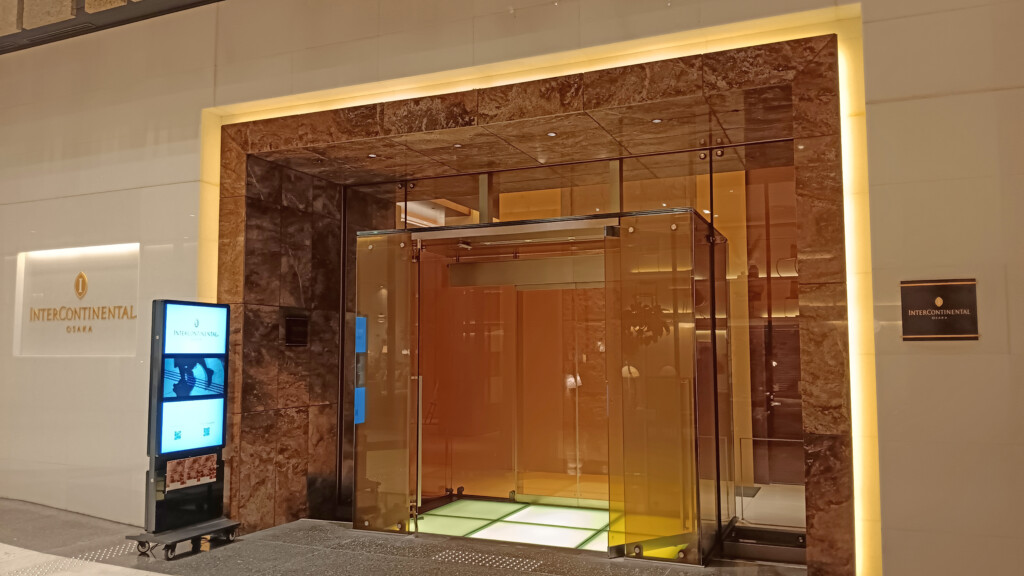 a glass elevator with lights