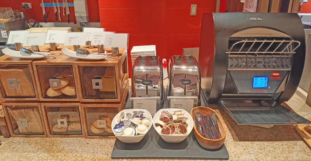 a group of bowls of food on a counter