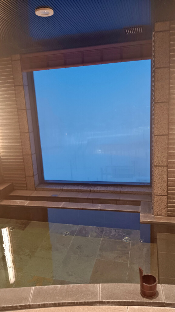 a window with a blue sky