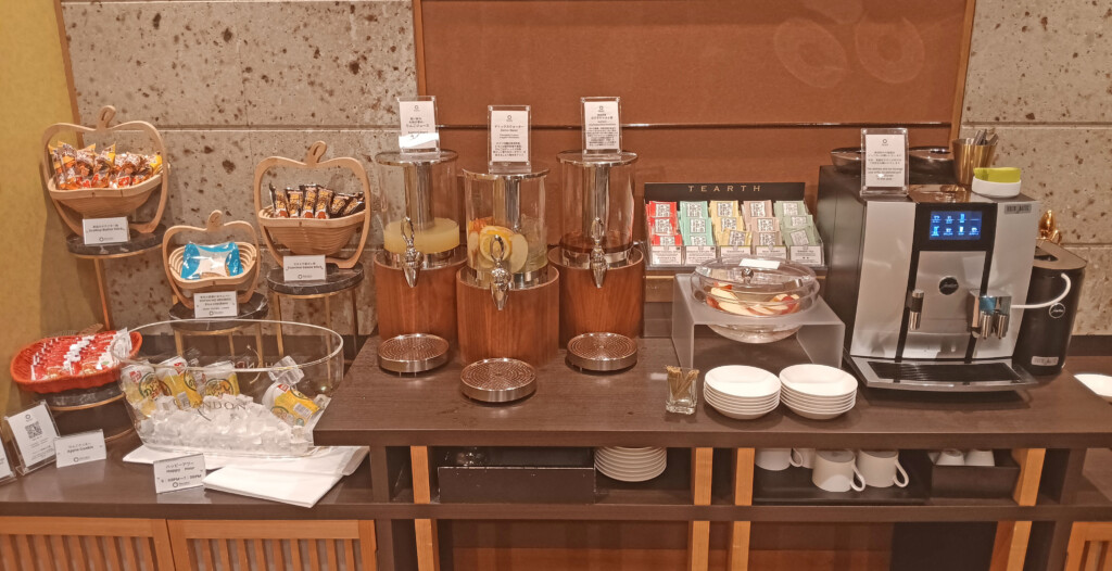 a table with a group of drinks dispensers