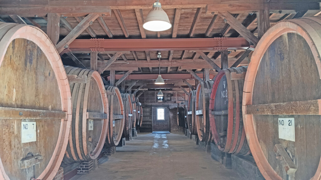 a room with wooden barrels