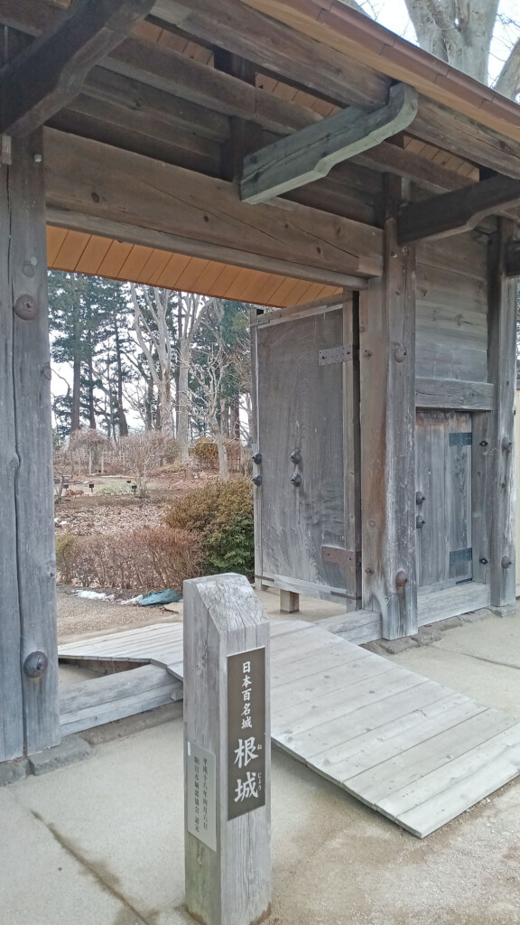 a wooden building with a wooden door