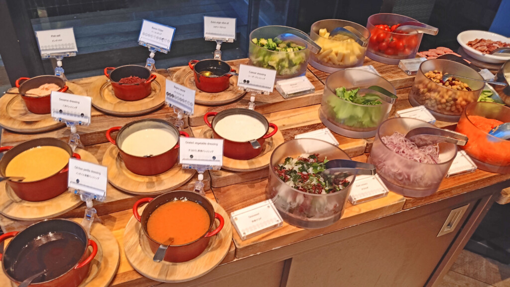 a table with bowls of food