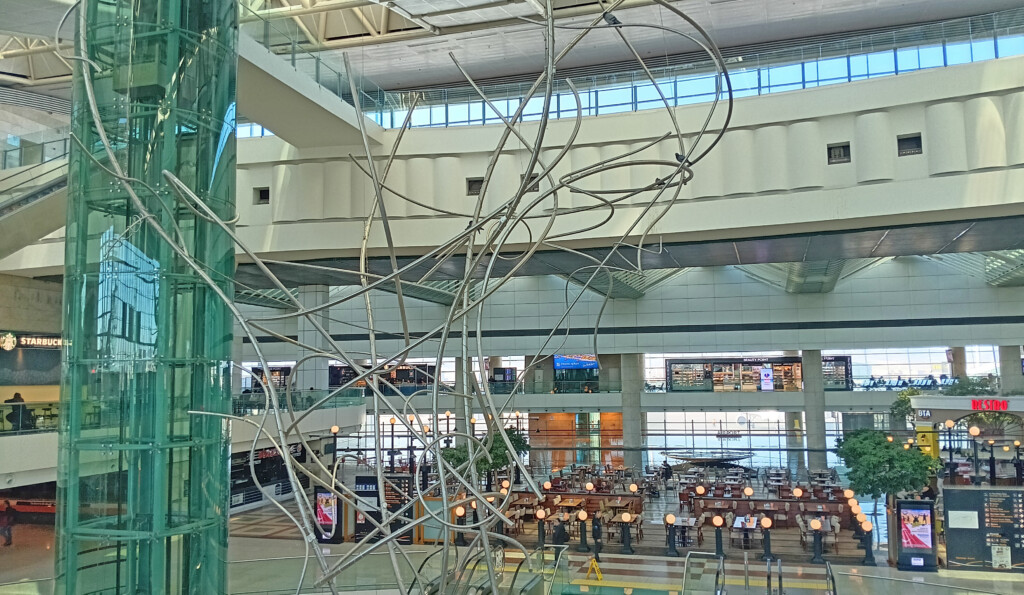a large metal sculpture in a building